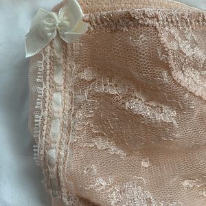 NWT Panties size M creme colored sheer with bows